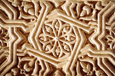 Granada, İspanya - 6 AĞUSTOS 2016: Alhambra sarayındaki soyut süs duvarının yakın çekimi.