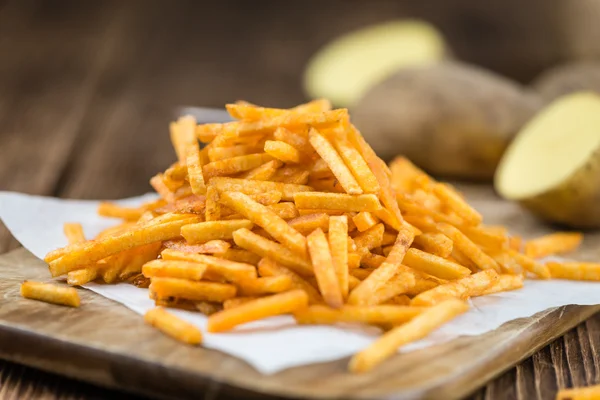 Portion gebratene Kartoffelstäbchen — Stockfoto