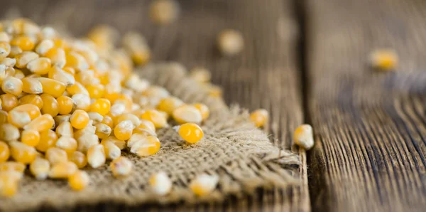 Corn  on vintage wooden background — Stock Photo, Image