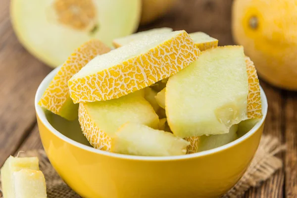 Honeydew Melon on an old wooden table — Stock Photo, Image