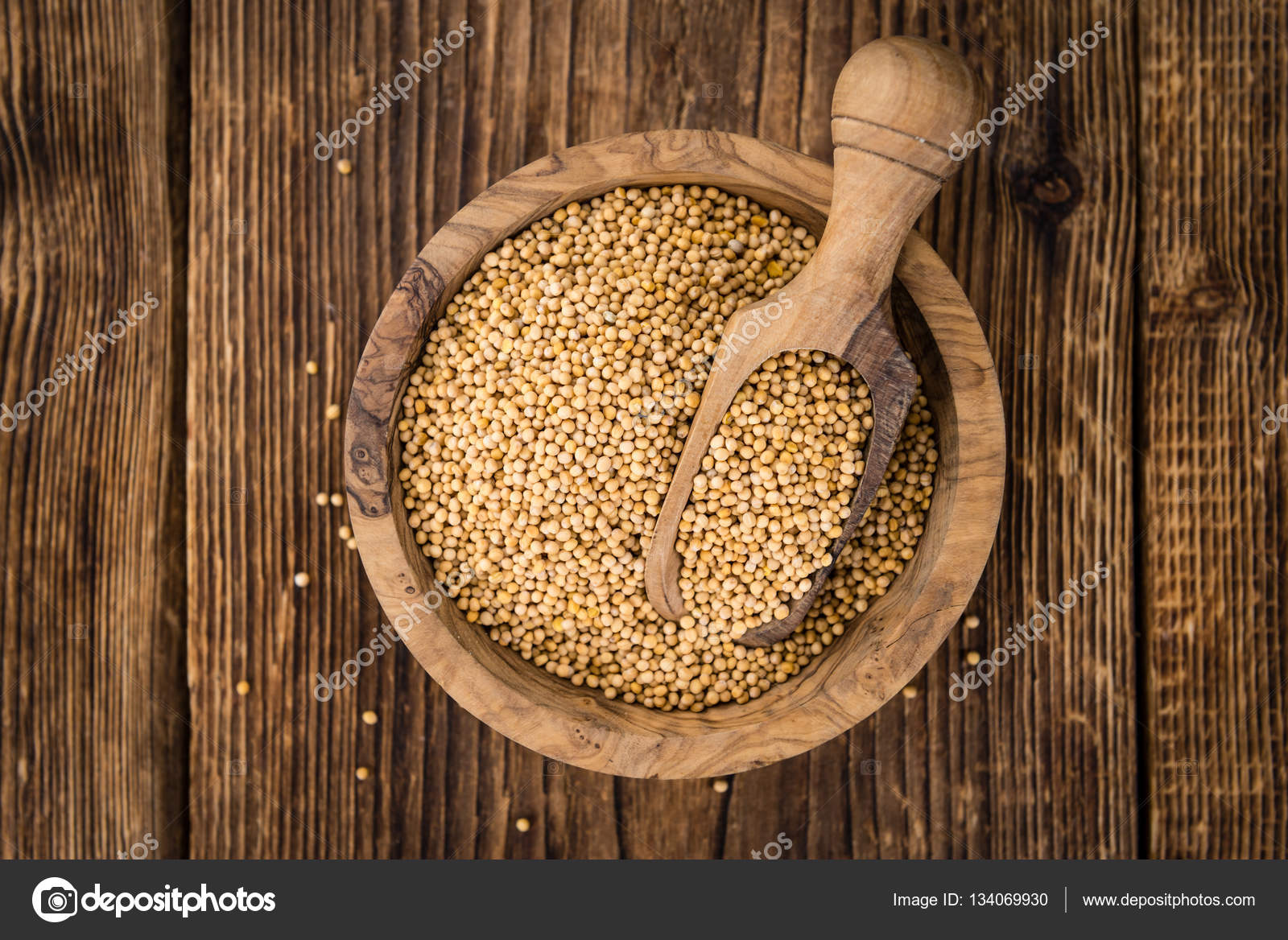 Mustard Seeds on wooden background — Stock Photo © HandmadePicture