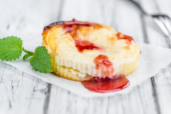 Cheesecake with berry Sacue — Stock Photo, Image