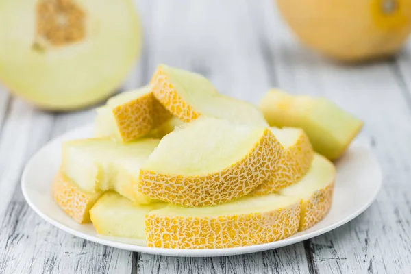 Honeydew meloner på en vintage bakgrund — Stockfoto
