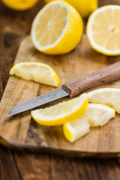 Lemon Slices on an wooden table — Stock Photo, Image