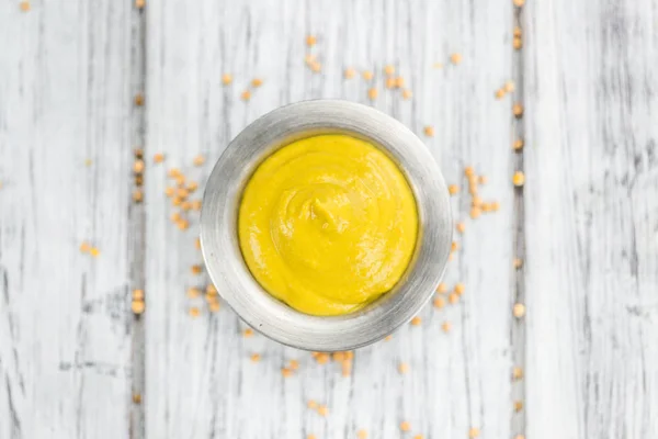 Fresh made Mustard on a rustic background — Stock Photo, Image