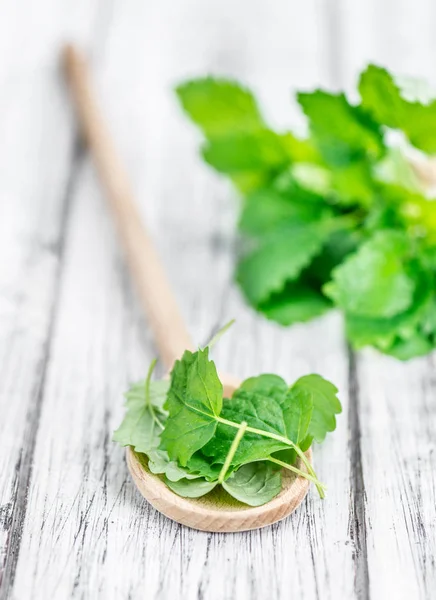 Balm (selective focus) on vintage wooden background — Stock Photo, Image