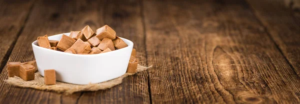 Caramel candies on table — Stock Photo, Image