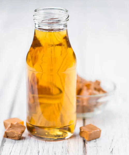 Caramel Syrup in jar — Stock Photo, Image