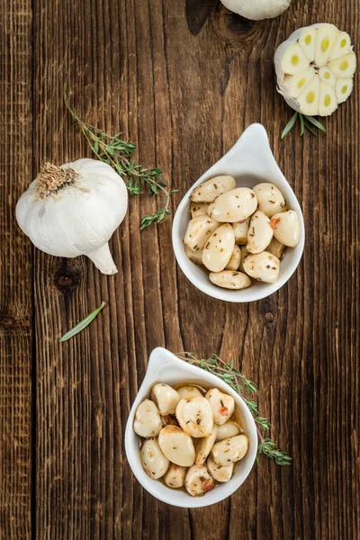 Preserved Garlic with herbs — Stock Photo, Image