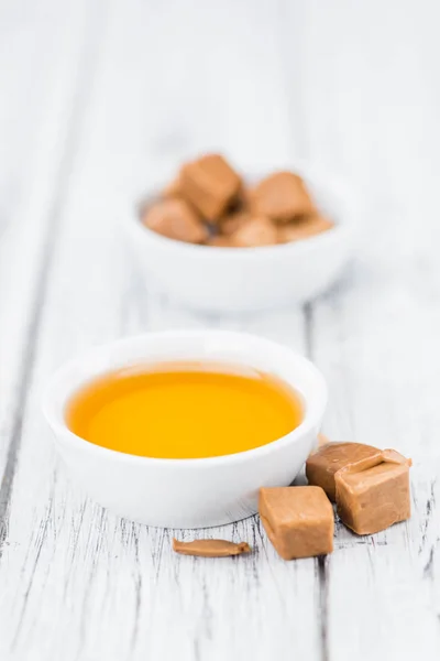 Caramel Sirup on table — Stock Photo, Image