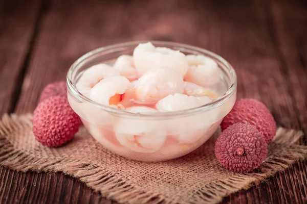 Preserved Lychees on a vintage background — Stock Photo, Image