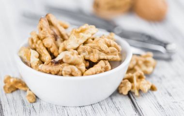 Walnuts (kernels) in bowl clipart
