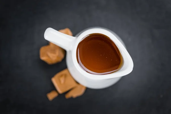 Portion of fresh Caramel Sirup — Stock Photo, Image