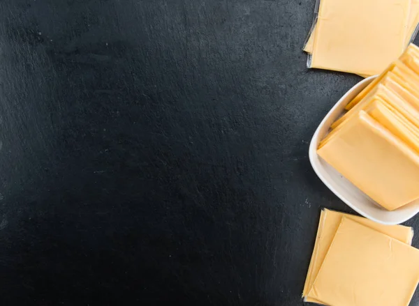 Porciones de queso en rodajas —  Fotos de Stock