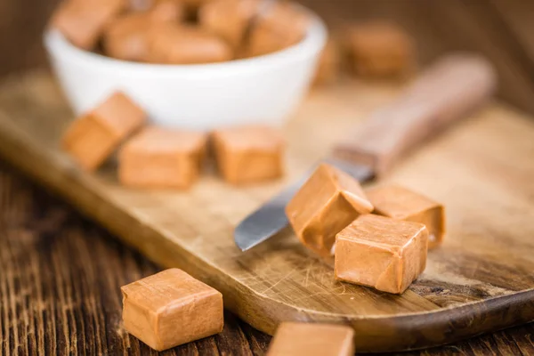 Doces de caramelo em um fundo vintage — Fotografia de Stock