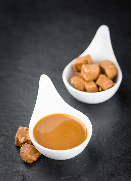 Portion of fresh Caramel Sauce — Stock Photo, Image