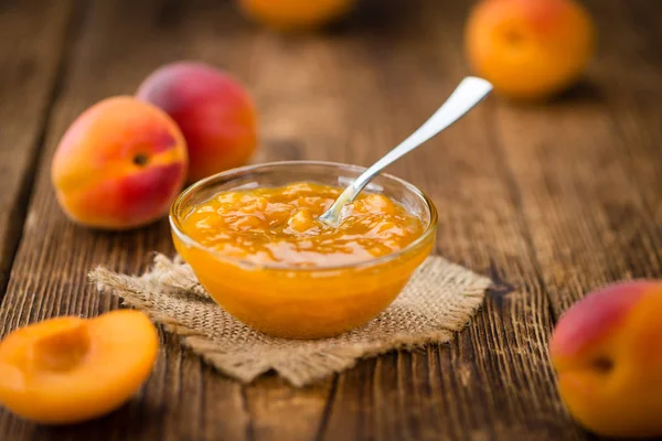 Apricot Jam on an old wooden table — Stock Photo, Image