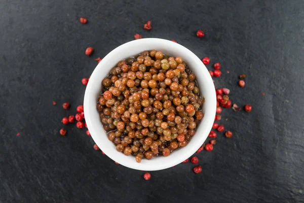 Mesa com conservas de pimenta — Fotografia de Stock