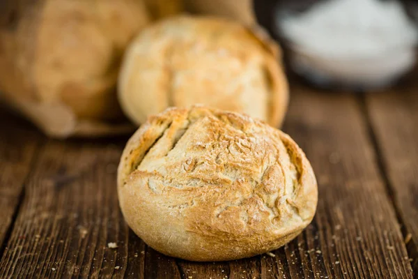 Rolls  on rustic wooden background — Stock Photo, Image