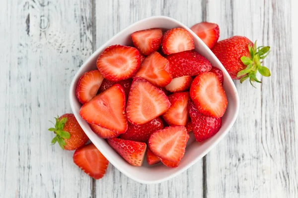 Strawberries on rustic wooden background a — Stock Photo, Image