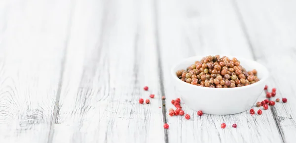 Portion of preserved Pink Peppercorns — Stock Photo, Image