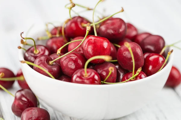 Fresh Cherries on vintage wooden background — Stock Photo, Image