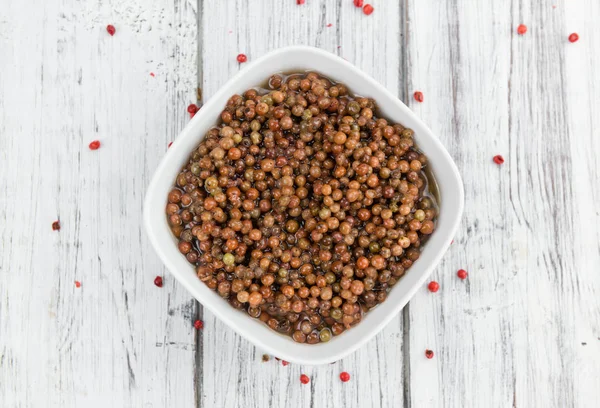 Portion of preserved Pink Peppercorns — Stock Photo, Image