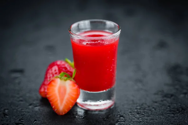 Liqueur on a vintage slate slab — Stock Photo, Image