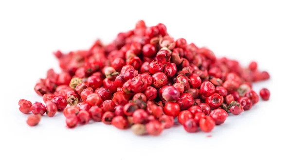 Peppercorns rosa aislado sobre fondo blanco — Foto de Stock