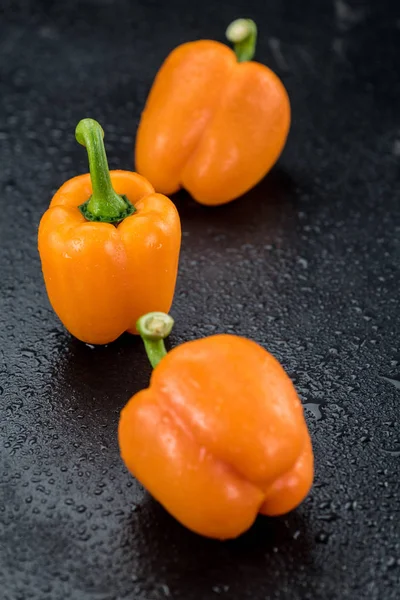 Fresh orange paprika peppers — Stock Photo, Image