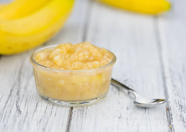 Mashed Bananas on wooden table — Stock Photo, Image