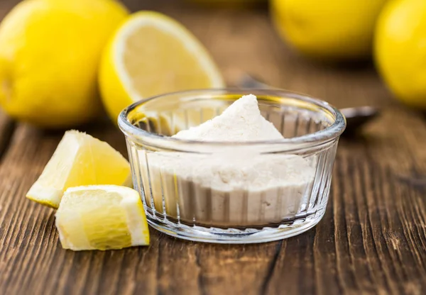 Wooden table with Lemon powder — Stock Photo, Image