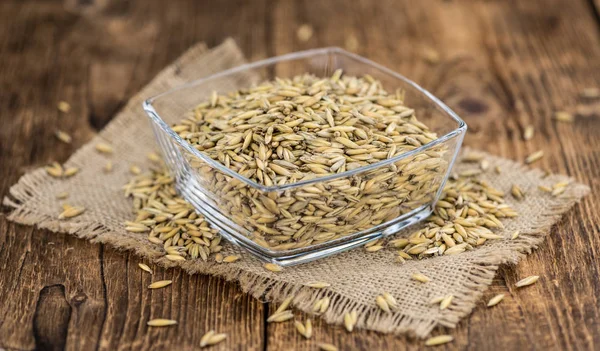 Porción de avena sana en una mesa de madera vieja (enfoque selectivo ; —  Fotos de Stock