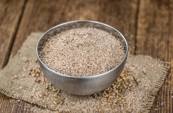 Some fresh Wheat Bran (selective focus; close-up shot) — Stock Photo, Image