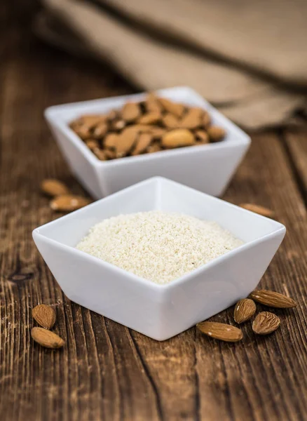 Portion Fresh Powdered Almonds Old Wooden Table — Stock Photo, Image