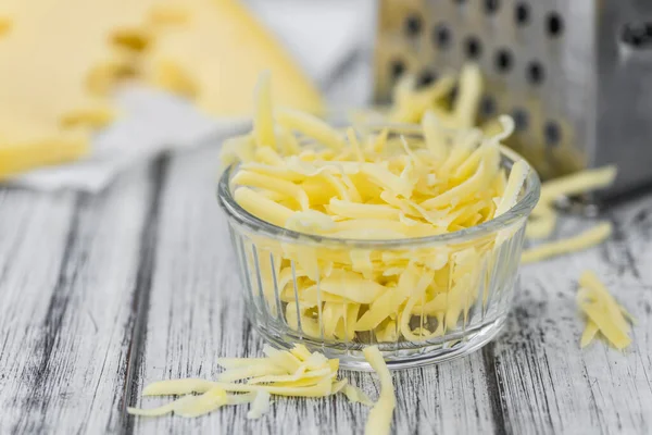 Old Wooden Table Grated Cheese Close Shot — Stock Photo, Image