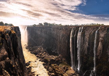 The great Victoria Falls (view from Zimbabwe side) during dry season clipart
