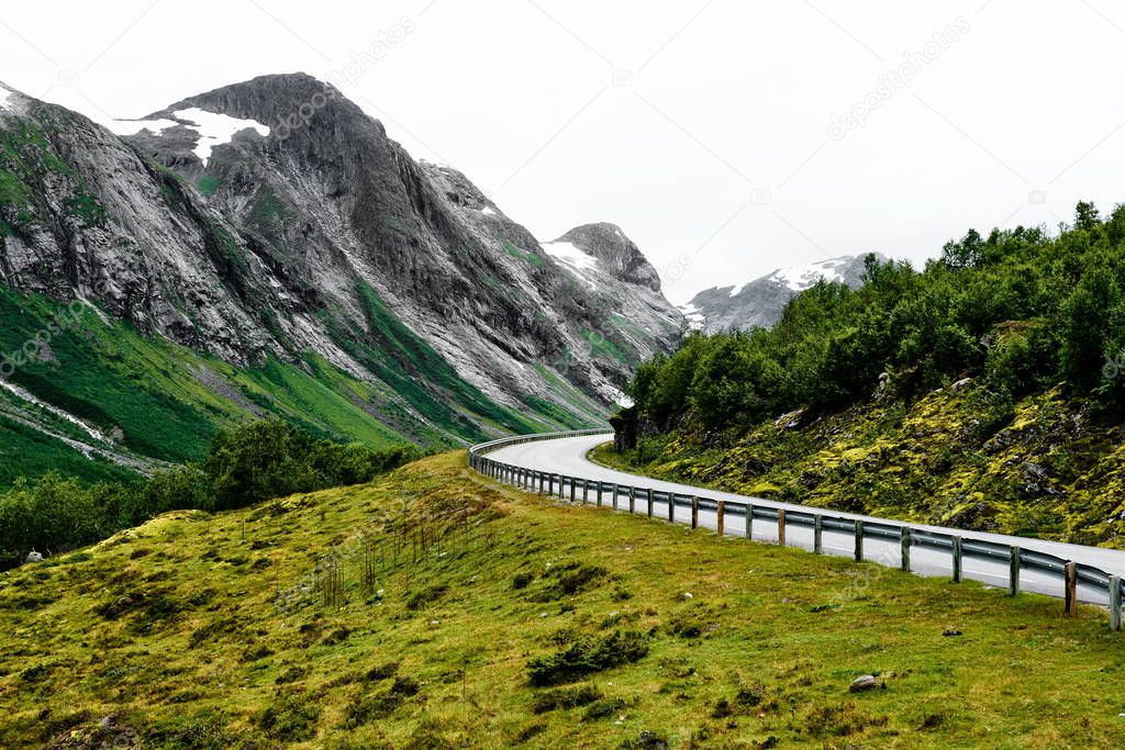 Road through the mountains in Norway with beautiful surrounding nature