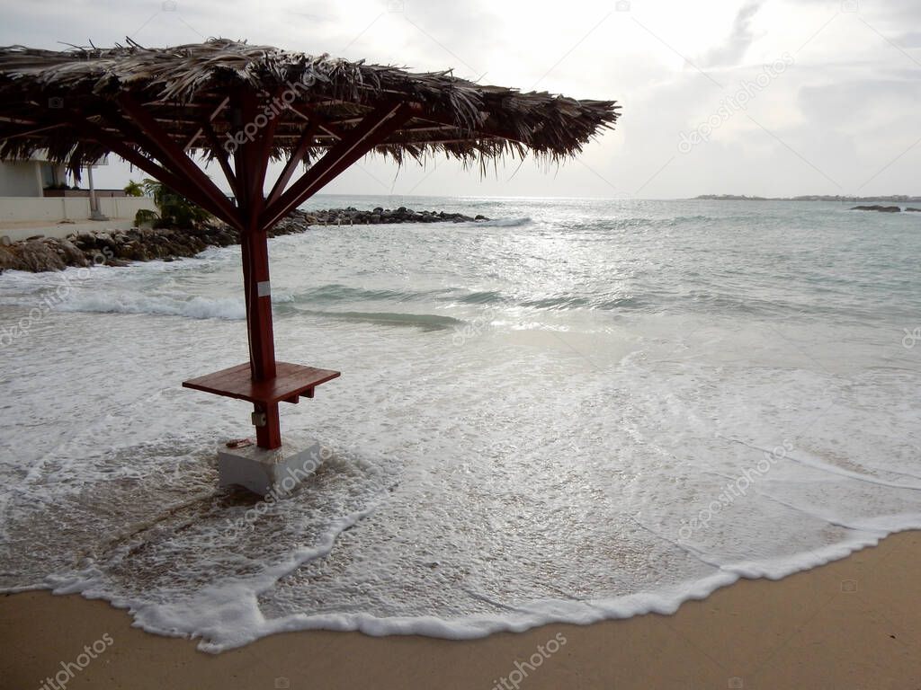 Water rises under the tiki hut on the beach as Hurricane Irma approaches St Martin in the Caribbean