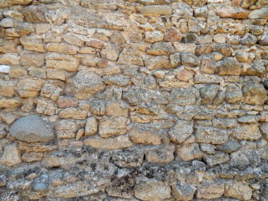 Kum taşı dokusu. Doğal şekilli kumtaşı eşsiz bir doku ve zemin yaratır..