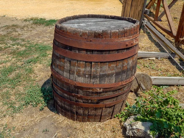 wooden barrel with iron rings in the fortress