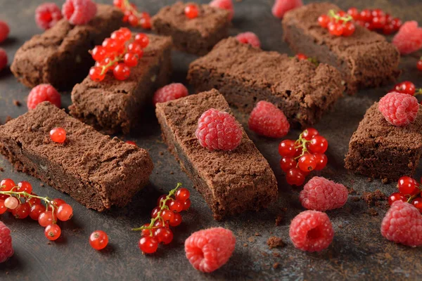 Brownies with raspberries and currants