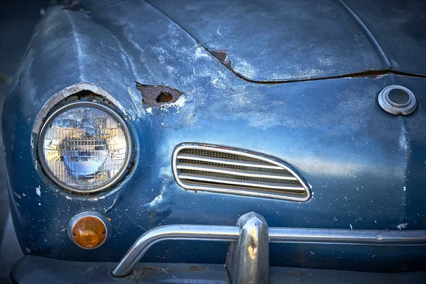 Vintage weathered unrestored blue German classic car with rust hole and tons of character — Stock Photo, Image