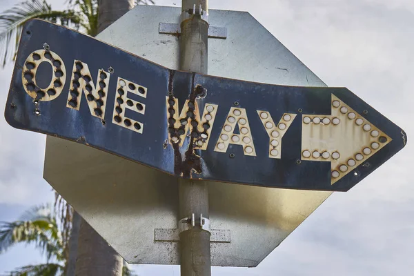 Old antique ONE WAY sign still in use Royalty Free Stock Photos