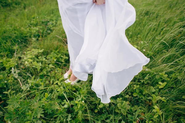 Beautiful bride dress flies — Stock Photo, Image