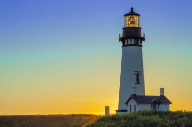 Yaquina Head Lighthouse at Sunset, Oregon, USA clipart