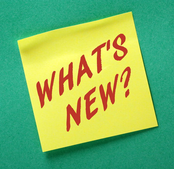 What 's New written on a yellow sticky note
