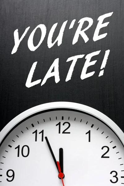 You're Late warning above a clock — Stock Photo, Image