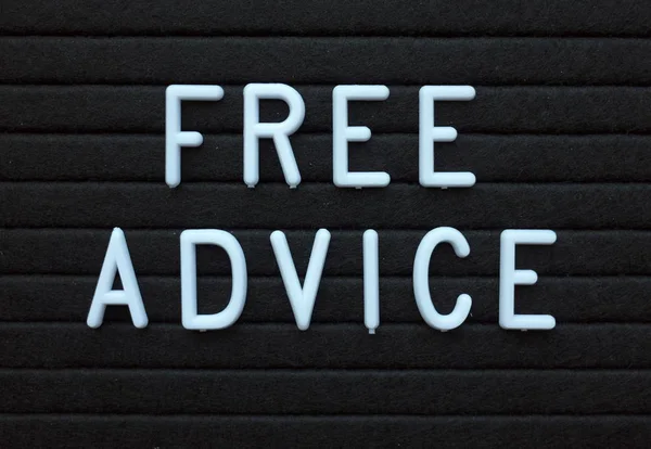 Palavras Free Advice Letras Plásticas Brancas Uma Placa Letra Preta — Fotografia de Stock