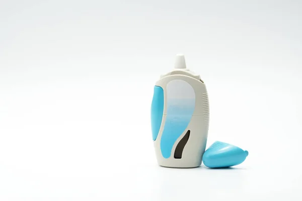 Nasal spray with opened cap, modern design on white background — Stock Photo, Image